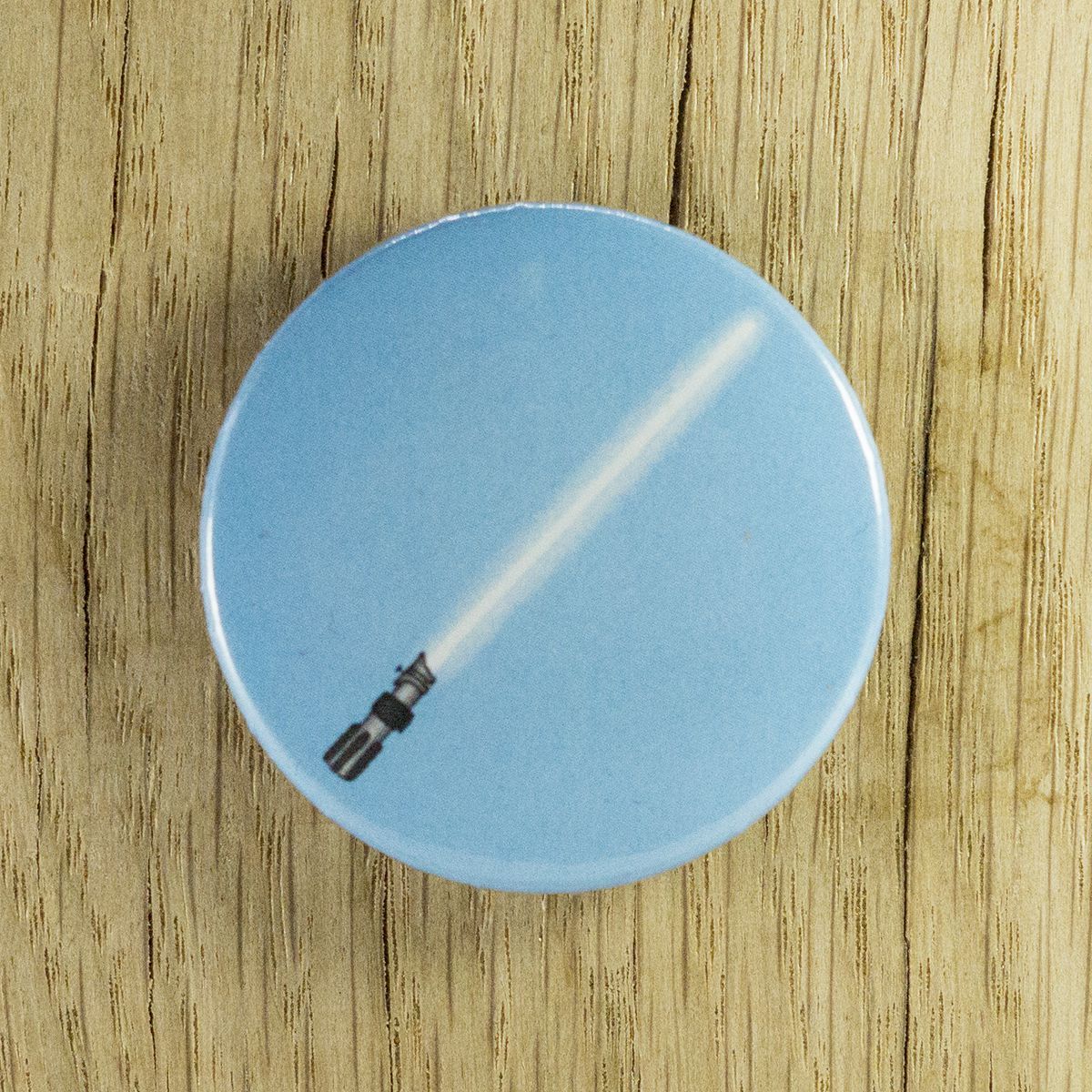 Badge sabre bleu – Star Wars